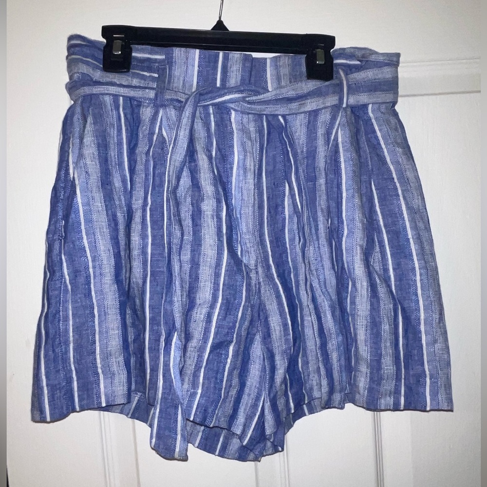 Women’s blue/purple shorts with belt from H&M! Size 6. Never worn! Tag still on!